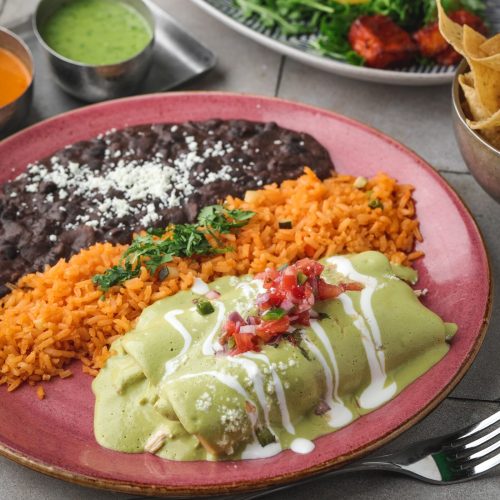 Verde Enchiladas with mexican rice and black beans